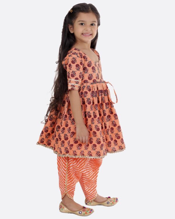 Cotton Blend Baby Girl's Jaipuri Print Frock Style Kurti With Frill Sleeves And Dhoti Style Salwar With Elastic Closure Ethnic Dress Clothing Set